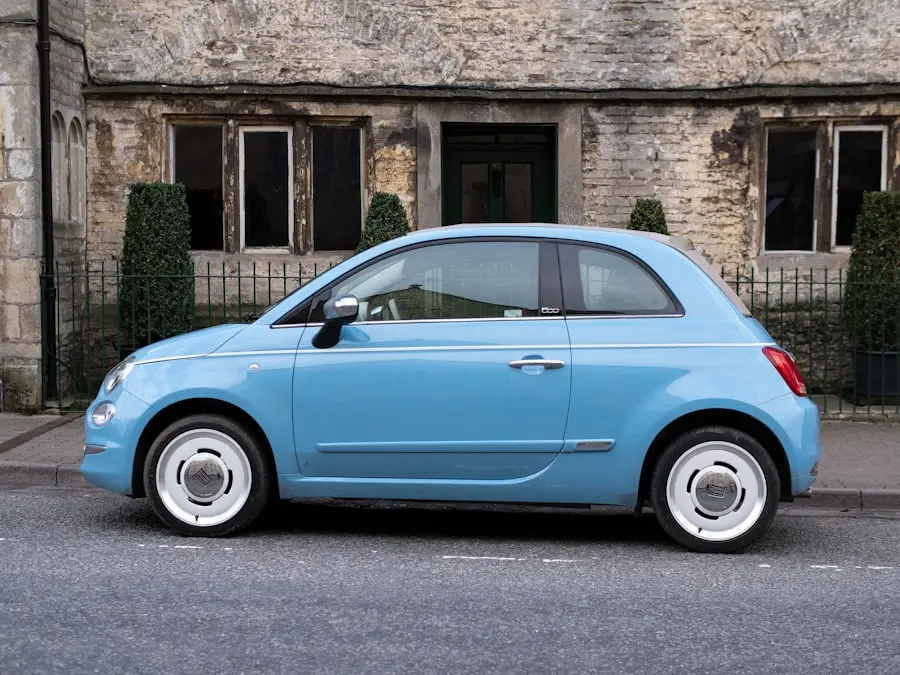 Light blue small car on a charming street – illustration